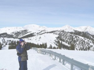 The Skiiing ABCs -- Brian snapping a photo of the Majestic Colorado Rockies on top of Monarch Mountan