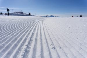 Groovy Hardpack not Powder Skiing -- a groomed ski run