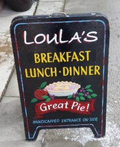 whitefish dining review -- a photo of Loula's Cafe sign