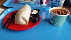 Whitefish Dining Review -- a burrito and bowl of chilli on a blue tray
