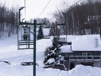 A picture from the main lift looking uphill at Whitecap Mountain Resort